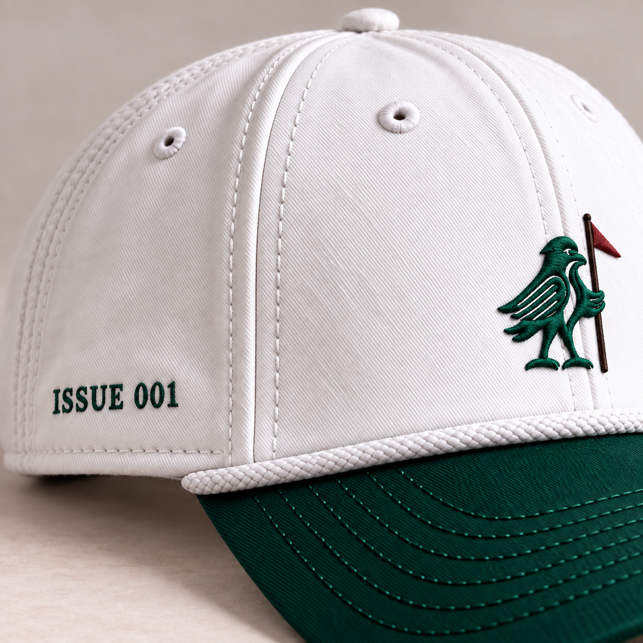 Close detail of The Stanley bird-and-flag embroidery and Issue 001 stitching.