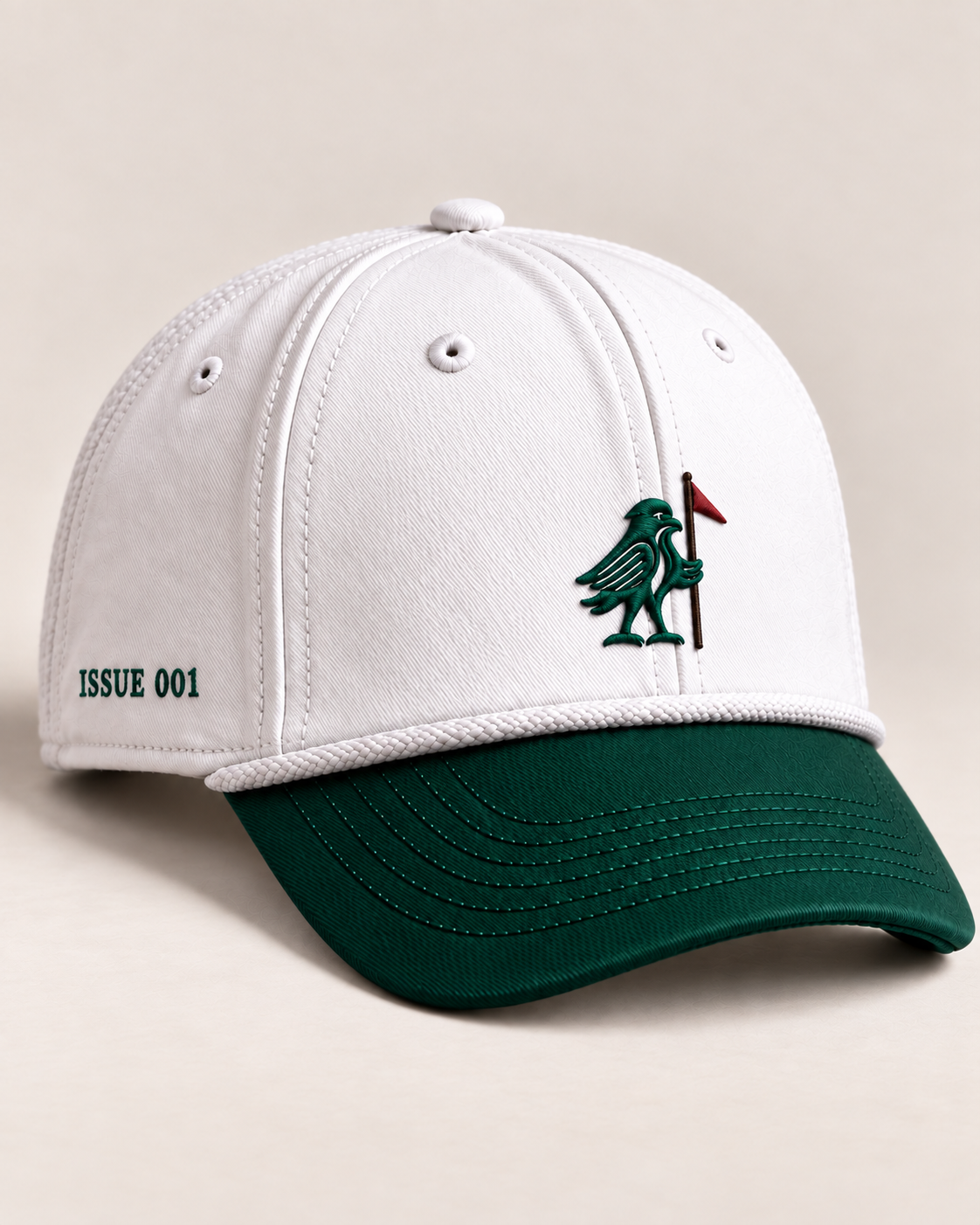 Front design preview of The Stanley cap with Issue 001 embroidery and bird-and-flag emblem.